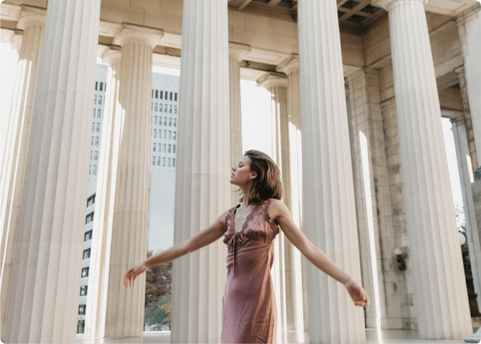 Finnleys product photography of a woman in a mauve satin dress