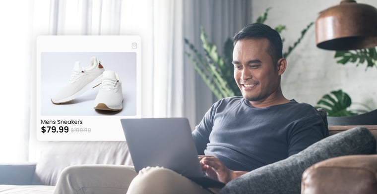 Man-at-laptop-on-an-ecommerce-store-with-a-discount-on-shoes