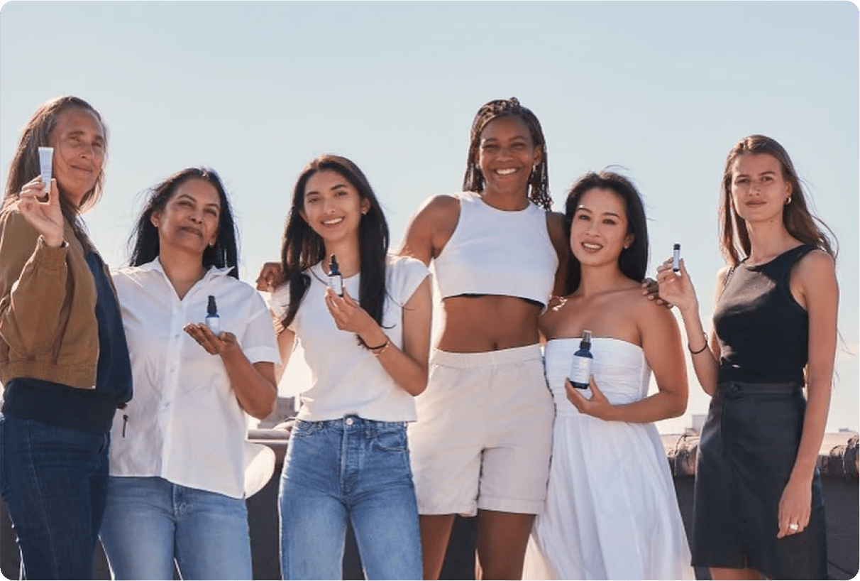 Six Province Apothecary customers holding products outside